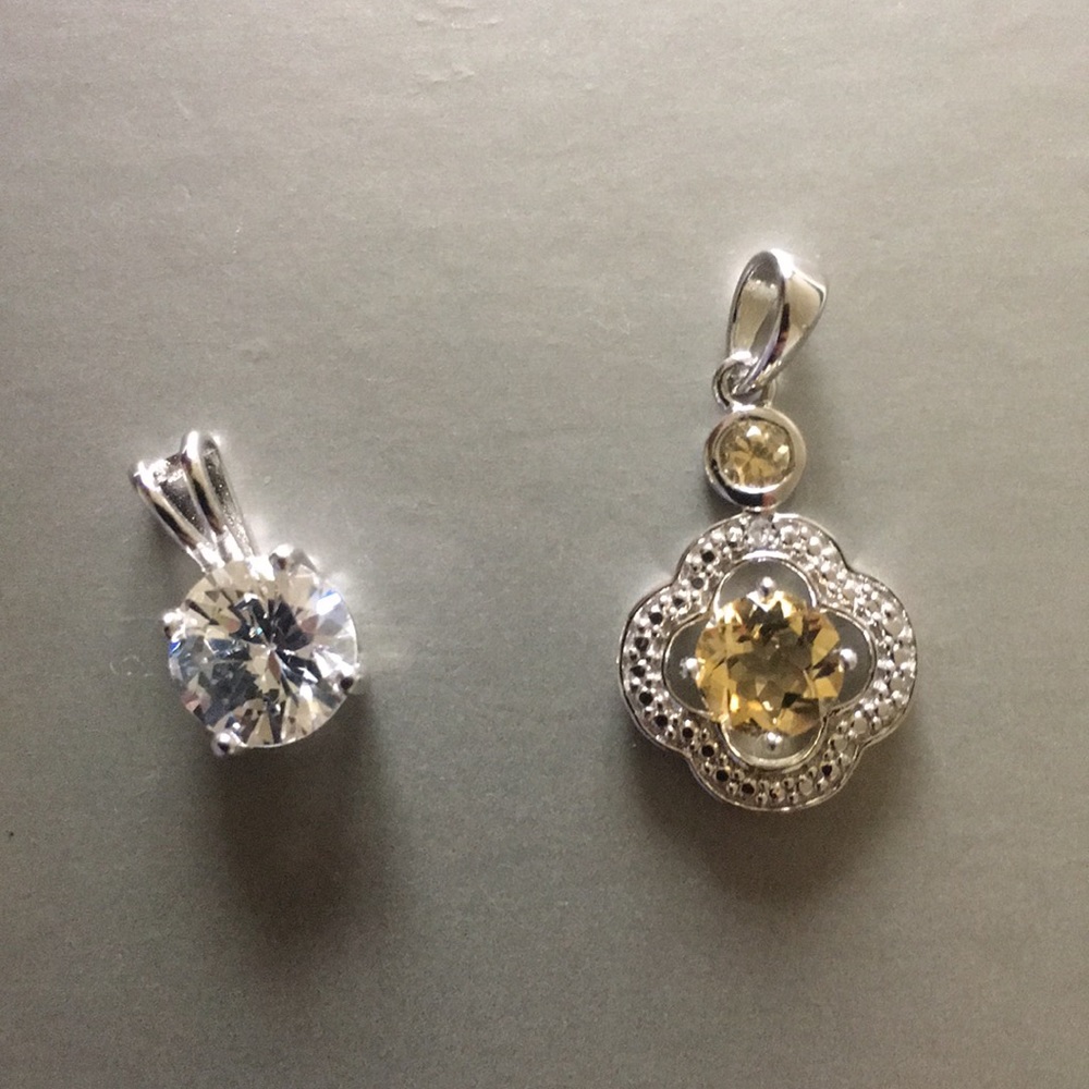 Two Sterling Silver Pendants